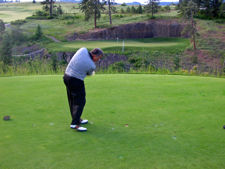 Dad doing what Dad does best, sticking greens with his low irons.