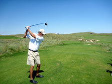 Jay goes through his pre-shot routine in preparation of teeing off at Ballyneal's final hole