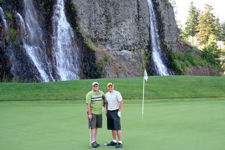 RJay and Bill at Black Rock's 13th hole with the 40 foot waterfalls that frames the hole in the background