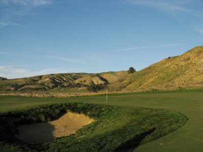 The green capes around a bunker at Rustic Canyons' 13th