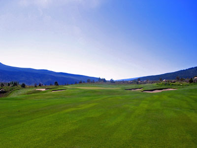 A classic dogleg left with a creek guarding the turn