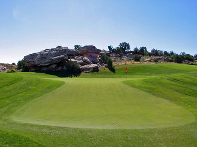 There is a forced carry required to reach the green that features a long tongue in front