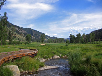The bridges and mountains are signature features at Snake River Sporting Club