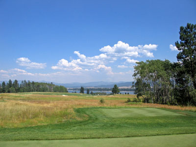 From the tee you must decide if you have the guts to aim at the smaller fairway on the right in order to go for the green in two
