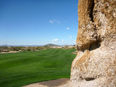The large boulder in the middle of the fairway is the signature feature of Troon North